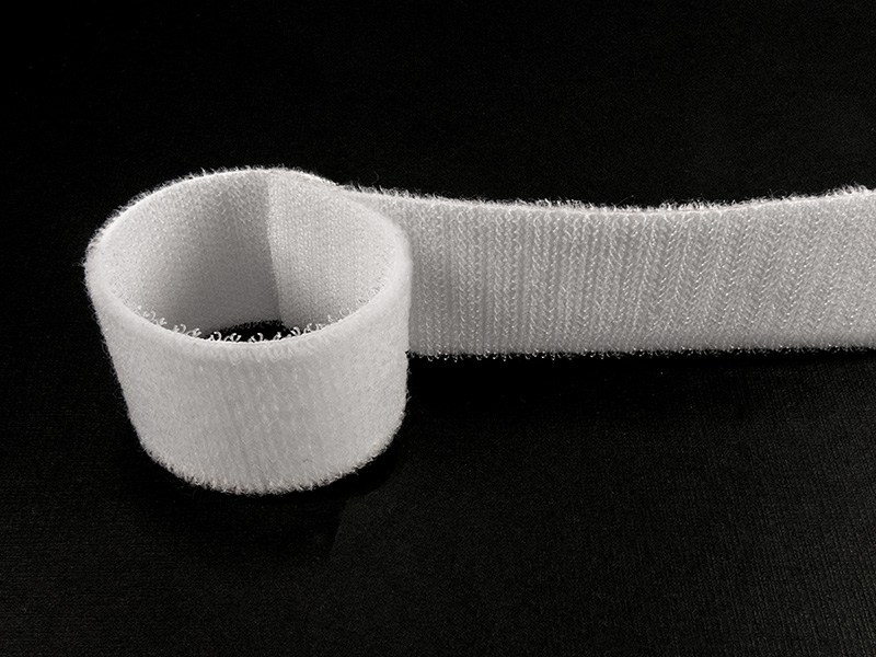 Zipová páska oboustranná  (501) bílá pes/nylon 25 mb